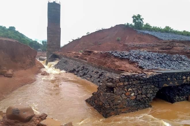 Tragic loss: Torrential rain and a flooded river breached this dam in Tivare, Maharashtra and claimed 14 lives | Image: IndiaYahooFinance