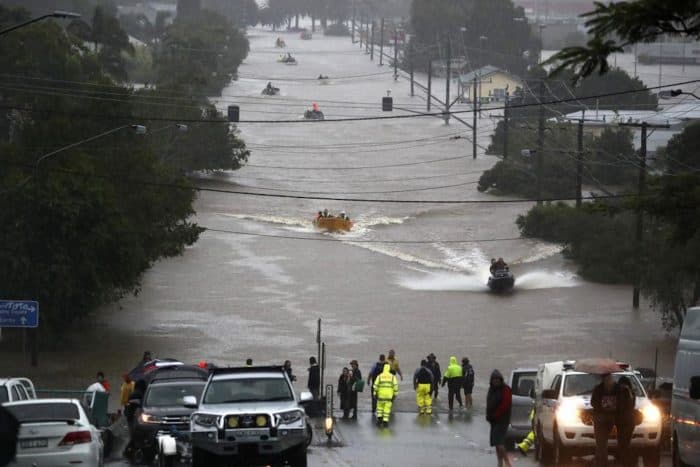 Down, under: 1,500 people were evacuated after torrential rains triggered flash floods in northeastern Australia. Photo: AP