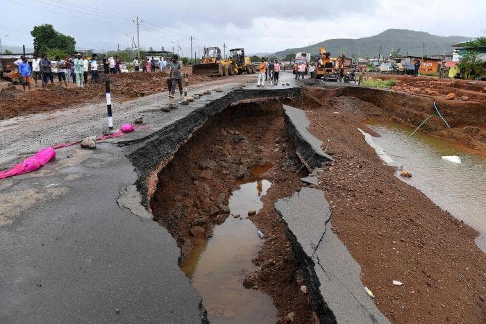 Unprepared: Heavy rain led to the collapse of section of a highway in Mahad, Maharashtra. Several death have been reported due to flooding and landslides in India this monsoon | Photo: The New York Times